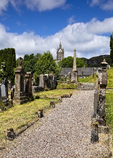 Tarbert Burial Ground with the Tower of Tarbert Parish Church in the Background 1 (161K)